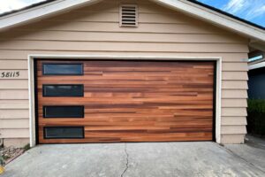 Technician repairing off track garage door in San Rafael CA