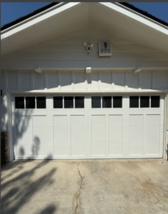 Professional technician servicing garage door system in San Rafael California